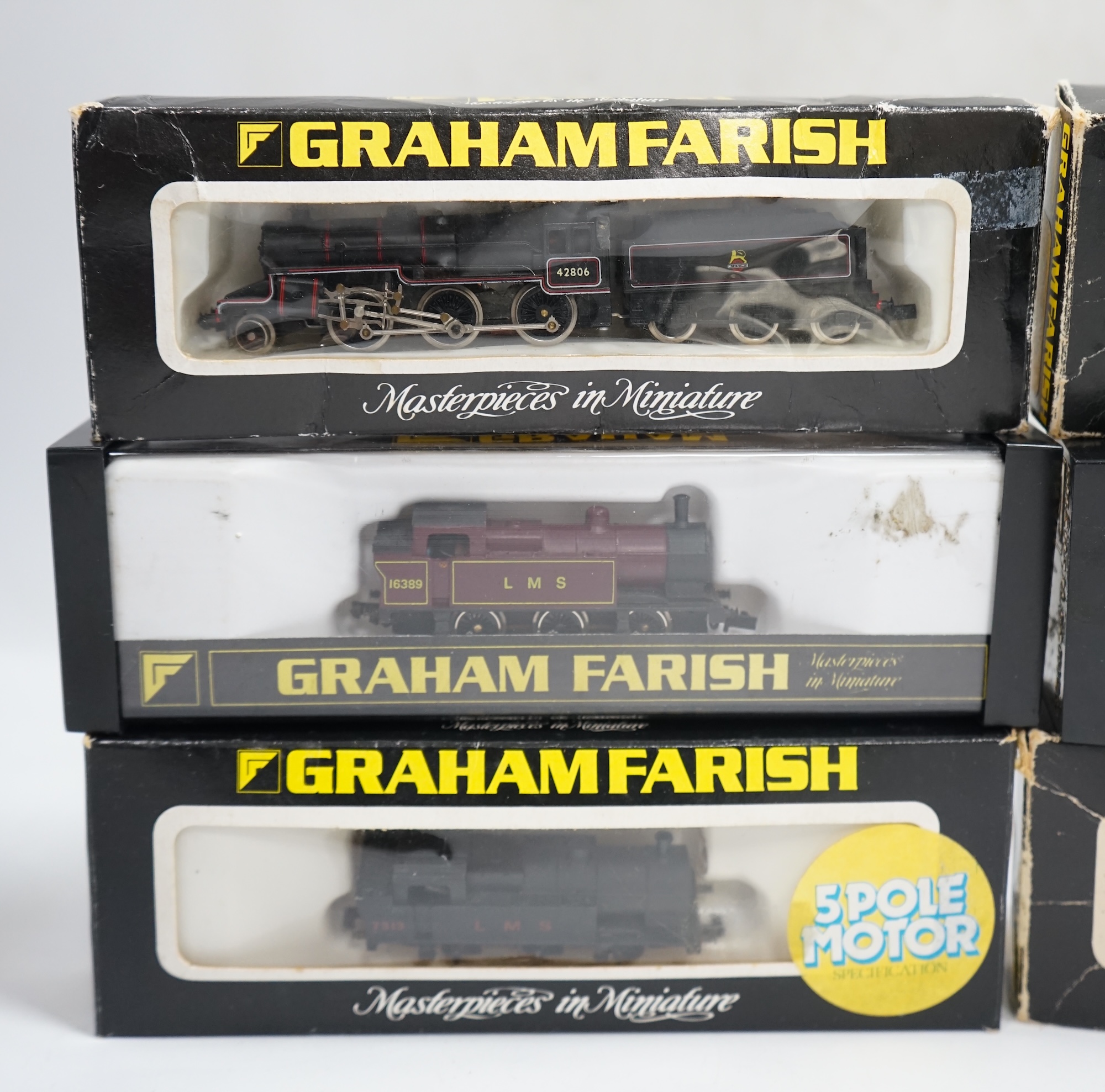 Six boxed Graham Farish N gauge locomotives; a GWR Castle Class, a GWR Prairie Tank, a GWR Pannier Tank, two LMS 0-6-0Ts, and a BR Class 5MT ‘Crab’. Condition - good, some wear to boxes and some locomotives in incorrect